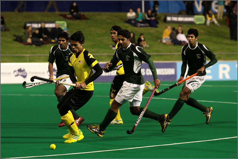 Pakistanische Spieler spielen gegen Malayisa