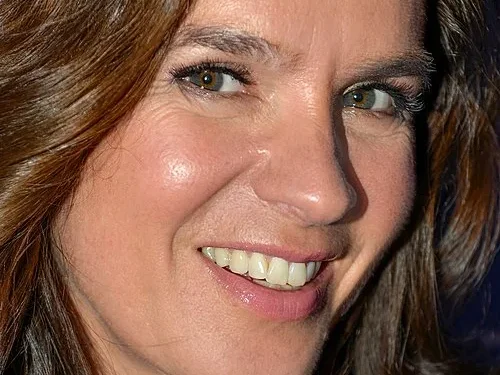 Katarina Witt lächelnd bei einem Event, Eiskunstlauf-Legende