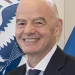 Gianni Infantino, FIFA-Präsident, lächelnd in einem Anzug